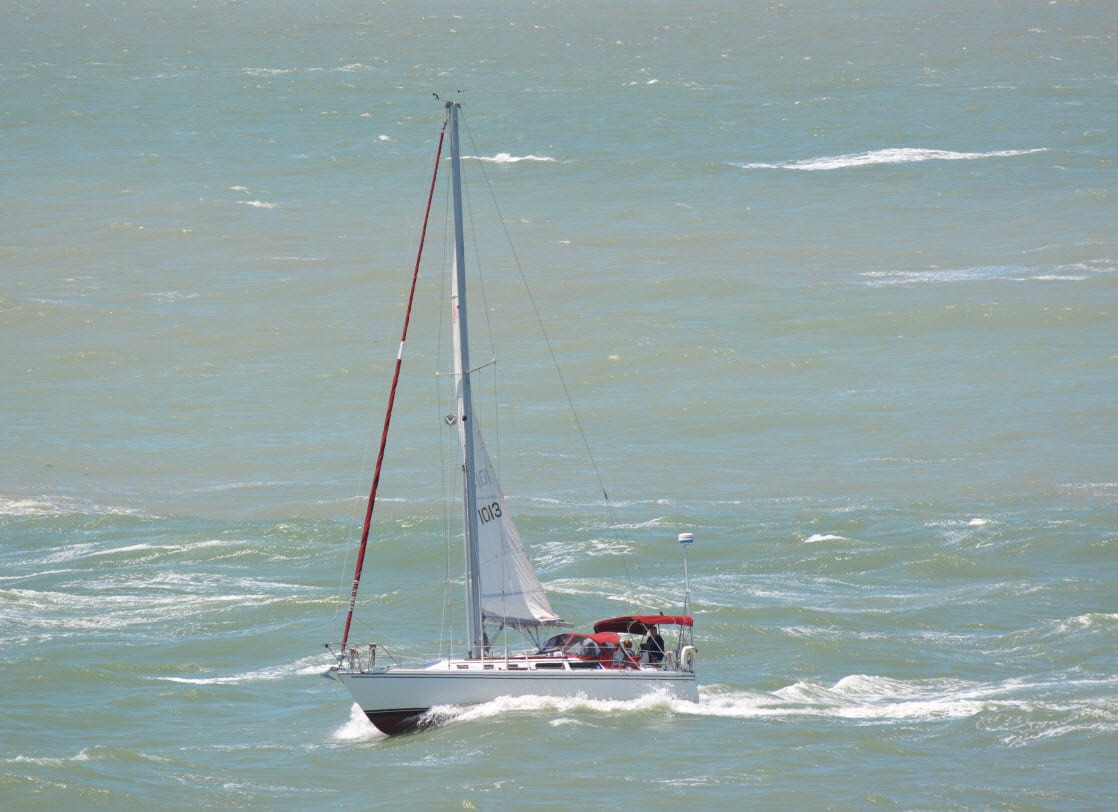 Sailing boat at rough sea in Clearwater Beach FL